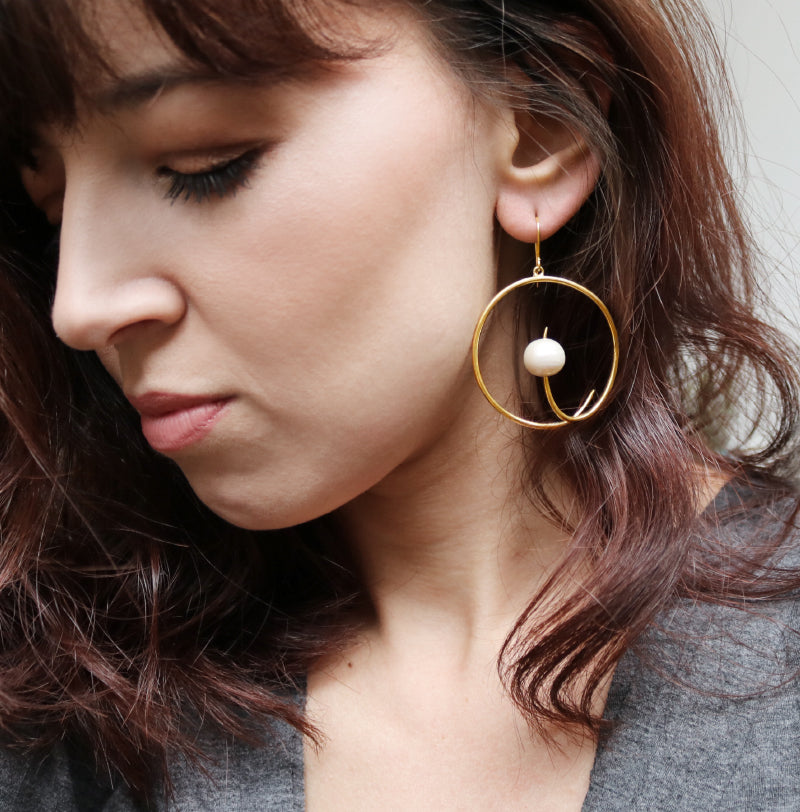 Spiral hoop earrings top