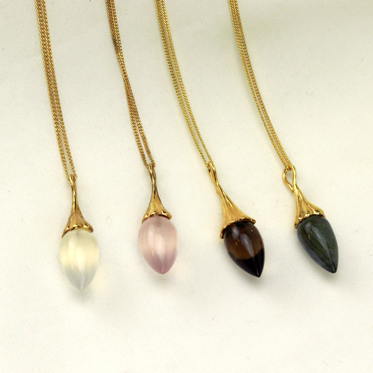 Beautifully crafted acorn pendants, offering a unique and nature-inspired design, perfect for adding a touch of elegance to any jewelry collection.