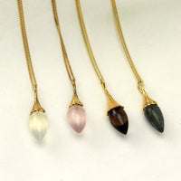 Beautifully crafted acorn pendants, offering a unique and nature-inspired design, perfect for adding a touch of elegance to any jewelry collection.