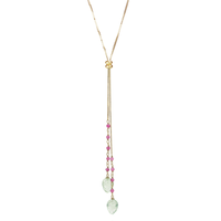 Elegant lariat necklace featuring carved green amethyst and vibrant pink tourmaline stones.