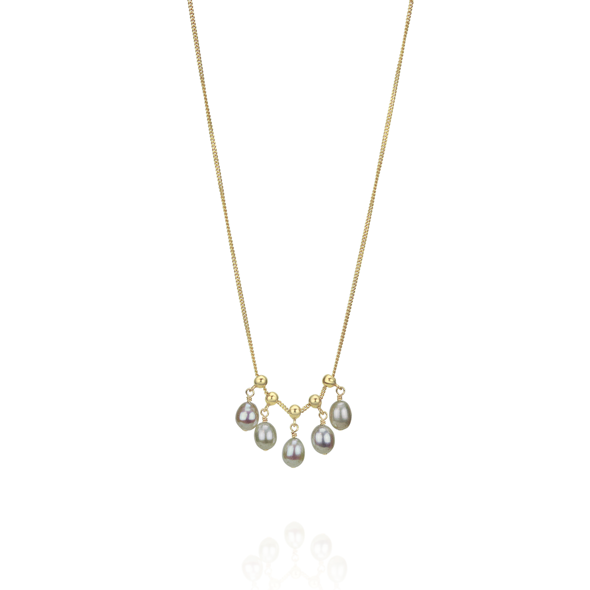 Elegant delicate adjustable grey pearl necklace, styled together for a refined look.