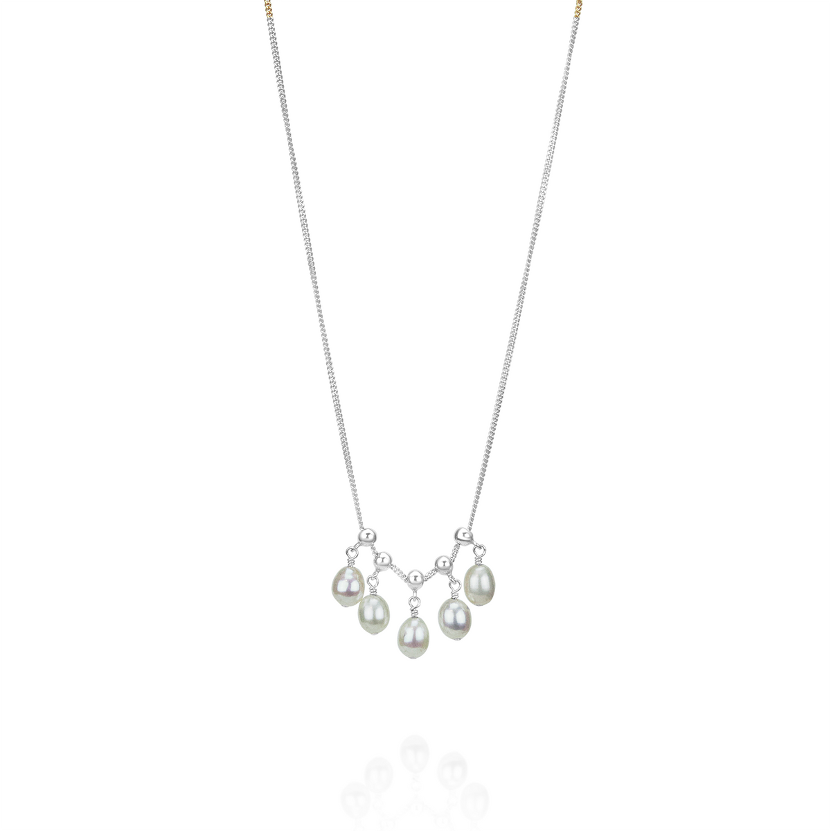 Delicate adjustable white pearl necklace, designed to be worn together for a layered look.