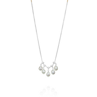 Delicate adjustable white pearl necklace, designed to be worn together for a layered look.
