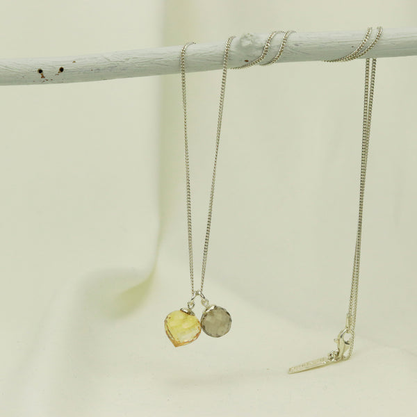 Stunning pendant featuring two complementary gemstones for a sophisticated and bold look.