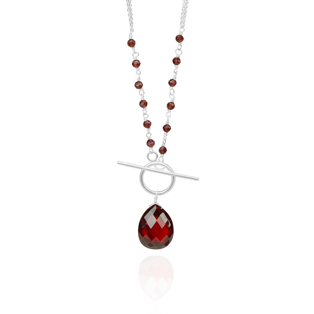 Elegant garnet and pear-shaped garnet silver toggle pendant with a timeless design.