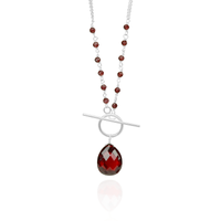 Elegant garnet and pear-shaped garnet silver toggle pendant with a timeless design.
