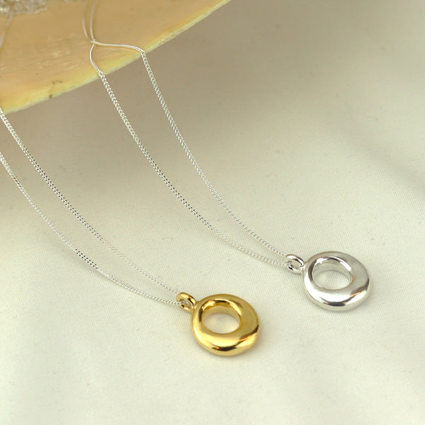 Elegant halo pendant featuring a sparkling design, perfect for adding a touch of sophistication to any ensemble.