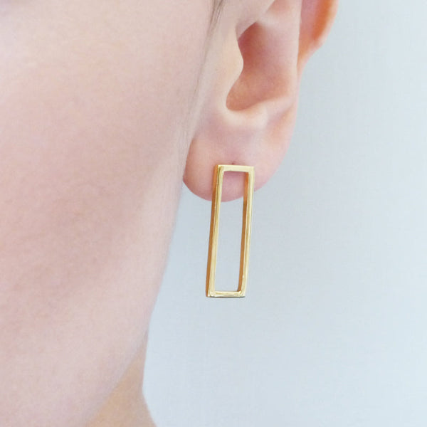 mounir-gold-plated-stud-earrings-on-model
